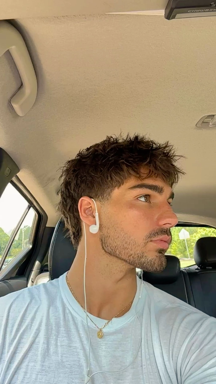 ALT: Stylish men haircut ideas for 40 year old men with a clean, modern medium length cut